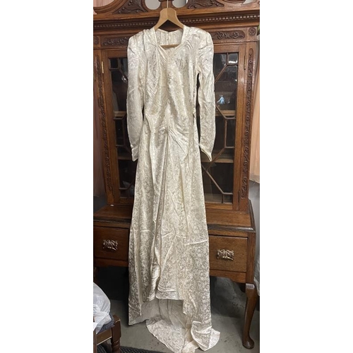 778 - A 1940's wedding dress embossed rayon with train