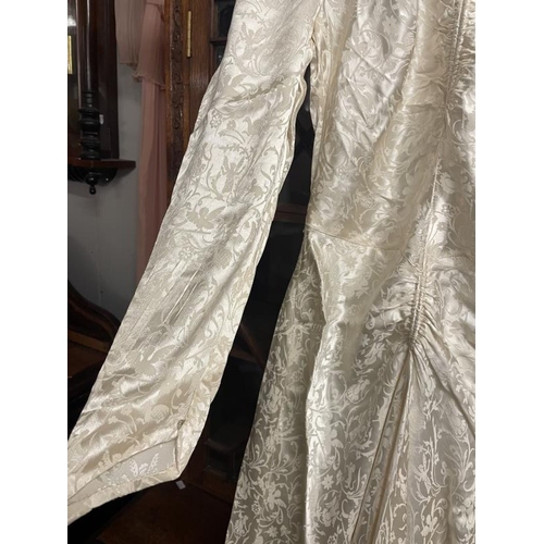 778 - A 1940's wedding dress embossed rayon with train