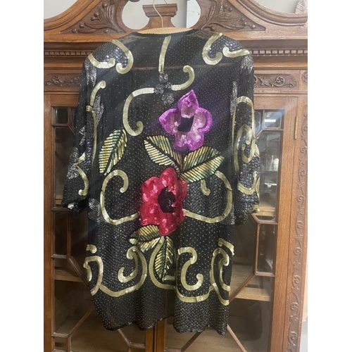 779 - A sequin embellished floral long sleeve shrug/jacket by Sudi, England, size M/L & a beaded & sequin ... 