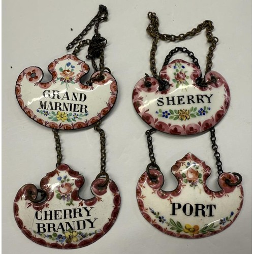 211 - Thirty old enamel decanter labels.