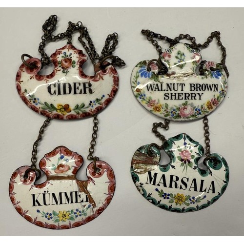 211 - Thirty old enamel decanter labels.