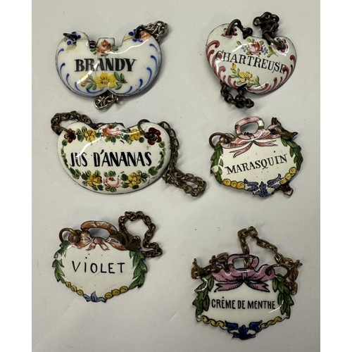 211 - Thirty old enamel decanter labels.