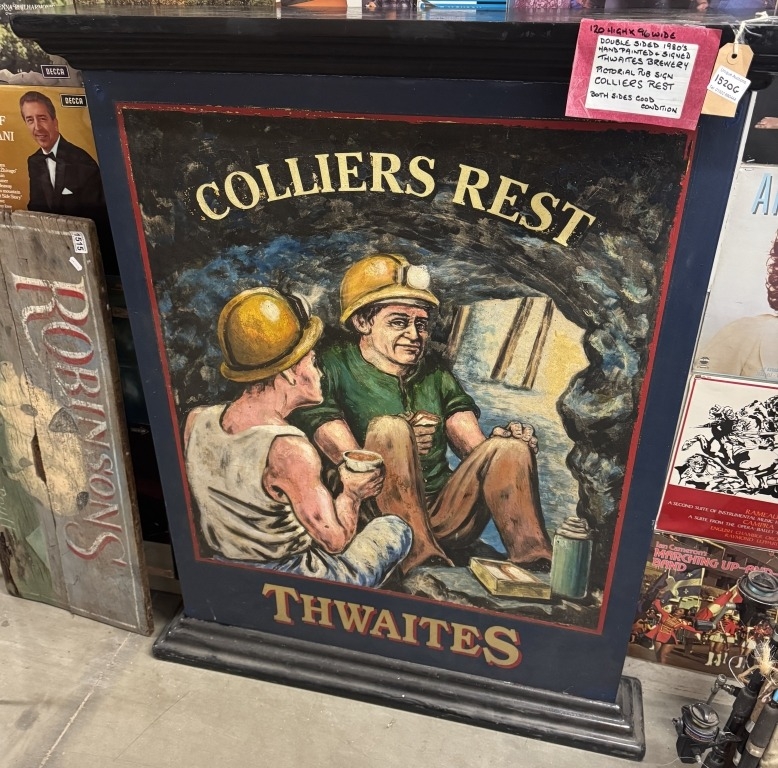 A large Colliers Rest Thwaites double sided pub sign