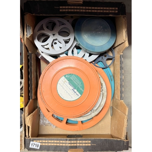 1710 - 2 boxes of cine-films & reels etc.