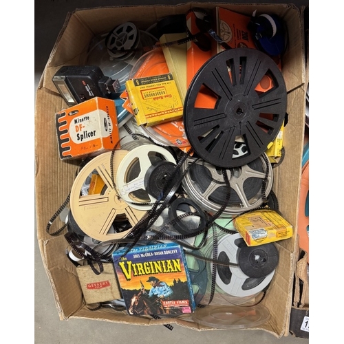 1710 - 2 boxes of cine-films & reels etc.