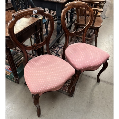 1763 - A pair of Victorian balloon back chairs