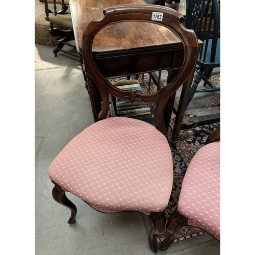 1763 - A pair of Victorian balloon back chairs