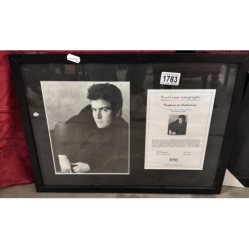 1783 - 2 Framed & glazed Charlie Sheen signed photographs