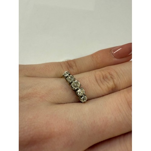 38 - A 18ct gold five stone diamond ring, size N, 2.6 grams.