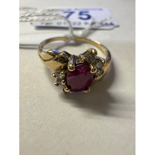 75 - A ruby & diamond cluster ring set with 6 diamonds in a gold shank, size P, 2.32 grams.