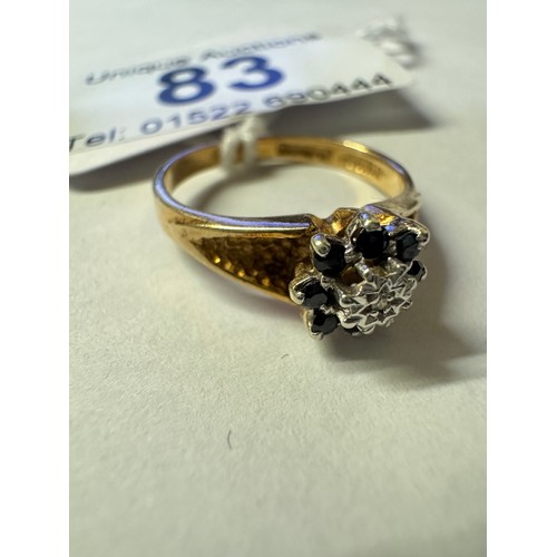 83 - A diamond and sapphire cluster ring, dated Sheffield 1979, 9ct gold, size L, 2.15 grams.