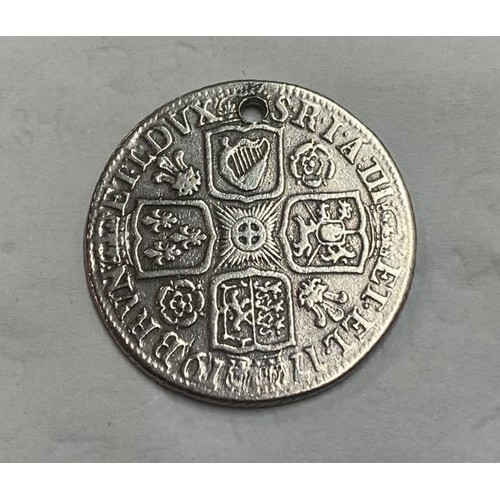 290D - A George I 1719 silver shilling (drilled whole for pendant)