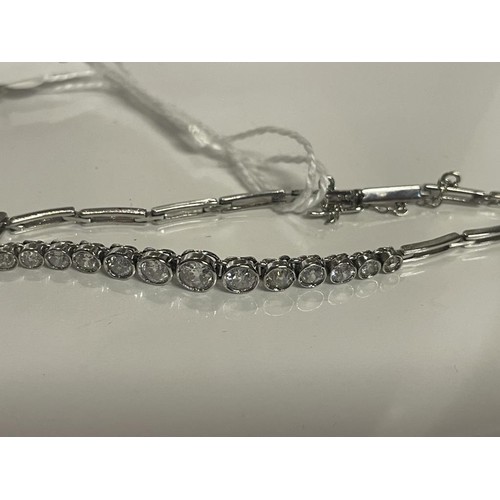 13 - A three carat plus 18ct white gold diamond bracelet, 7.49 grams.