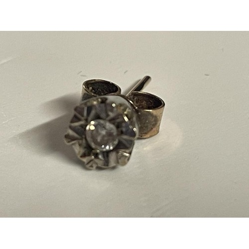 16 - A pair of white gold diamond stud earrings, 1.28 grams.