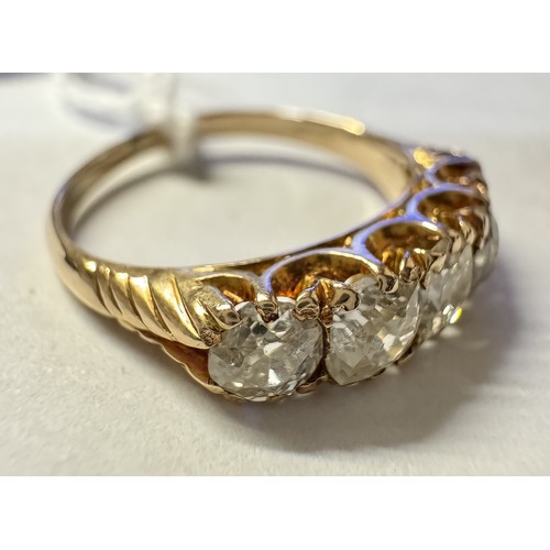 100N - A Victorian 18ct old mine cut five stone diamond ring, total approx. weight 1.5ct, size L,