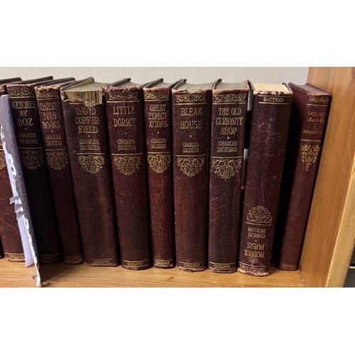 1831 - A collection of 22 Charles Dickens books & a poem book by Christina Rossetti on a pine rack