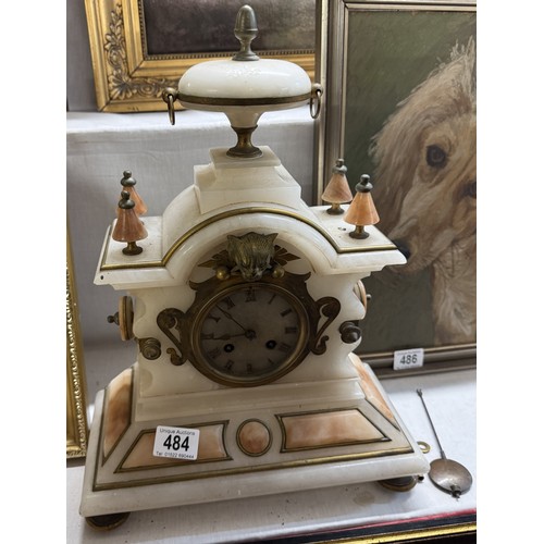 484 - A 19th century alabaster clock, in working order.