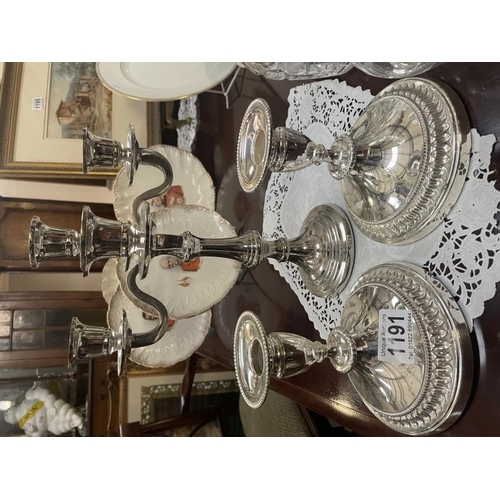 1191 - A silver plate candelabra and a pair of silver plate candlesticks.