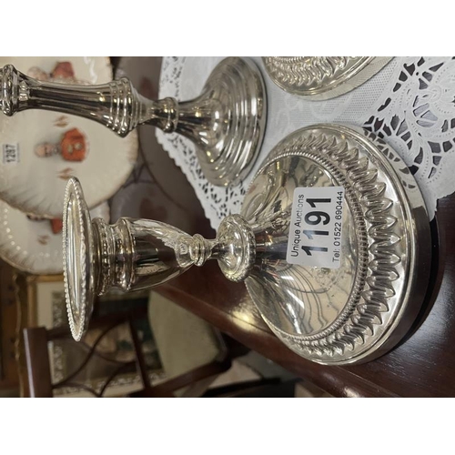 1191 - A silver plate candelabra and a pair of silver plate candlesticks.