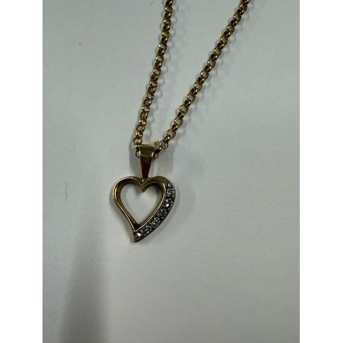 70A - A gold heart pendant set with diamonds on gold chain (All marked 9 ct gold)