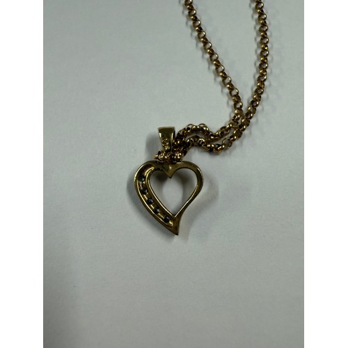 70A - A gold heart pendant set with diamonds on gold chain (All marked 9 ct gold)