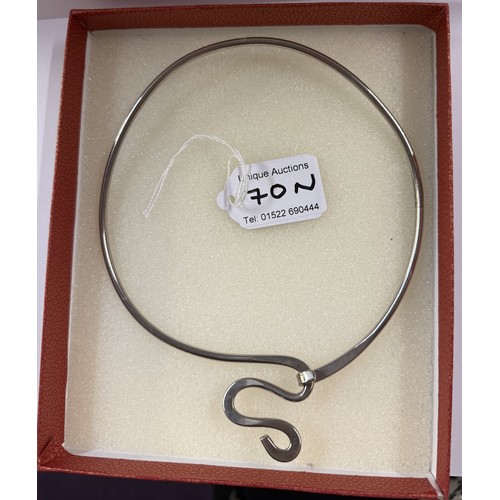 70N - A silver choker style necklace