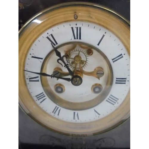 600F - A 19th century black slate mantel clock.