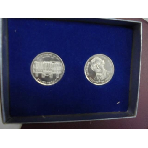 600J - A collection of 'Monarchs' coins sets and other coins.