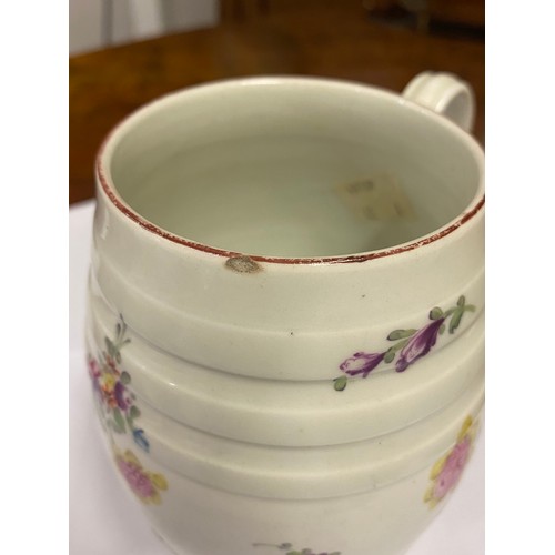 743 - A circa 1760 Derby ribbed barrel shaped mug, painted with floral spray & scattered sprigs, in colour... 