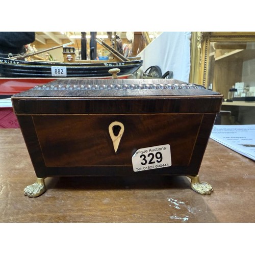 329 - A Regency mahogany tea caddy