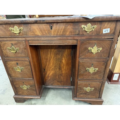 475 - A good quality small mahogany kneehole desk.