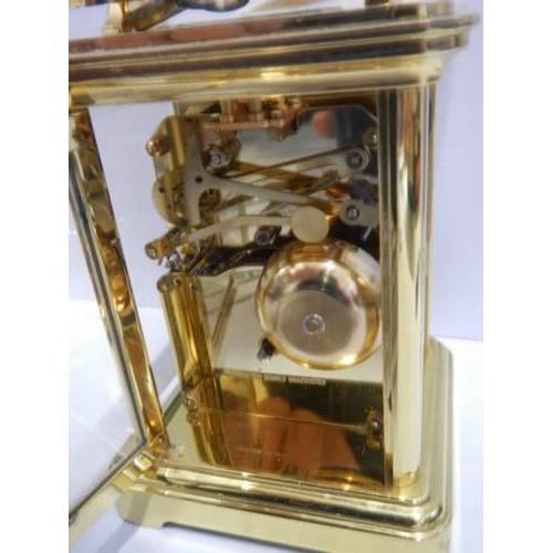 501 - A good quality mid 20th century brass repeating carriage clock by Rapport, London, in good working o... 