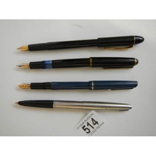 514 - Four vintage fountain pens.