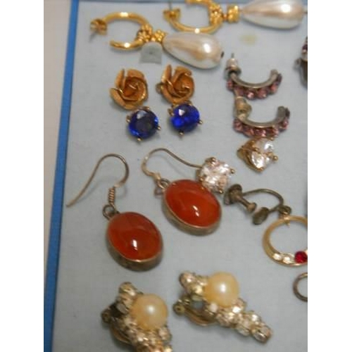 517 - Eleven pairs of assorted earrings.