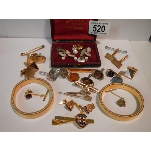 520 - A mixed lot of cuff links, tie pins etc.,