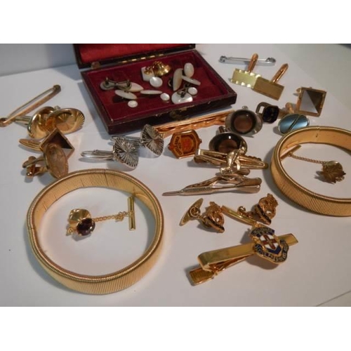 520 - A mixed lot of cuff links, tie pins etc.,