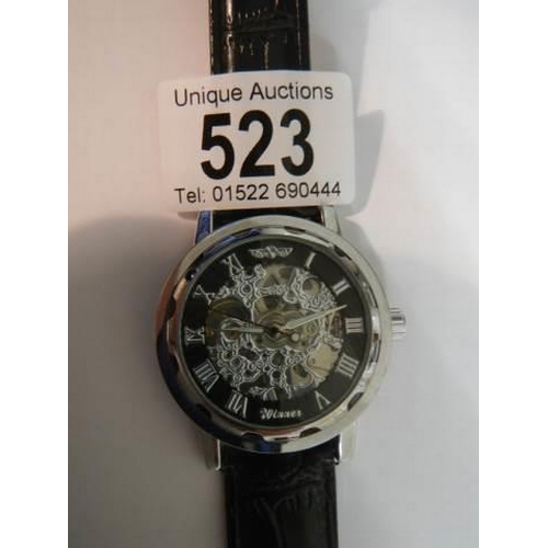 523 - A good Gent's Winner automatic wrist watch,.