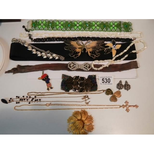 530 - A mixed lot of costume jewellery, belts etc.,