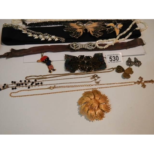 530 - A mixed lot of costume jewellery, belts etc.,