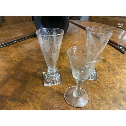 729 - 3 etched glasses. Small chips to base of 2.