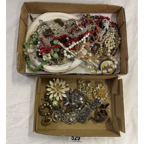 529 - Two trays of costume jewellery, some good other for spare or repair.