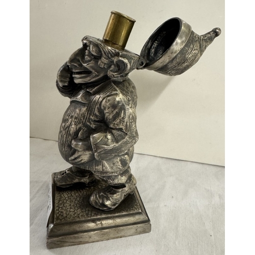 534 - A vintage spelter Mr Punch lighter Rd no 782230