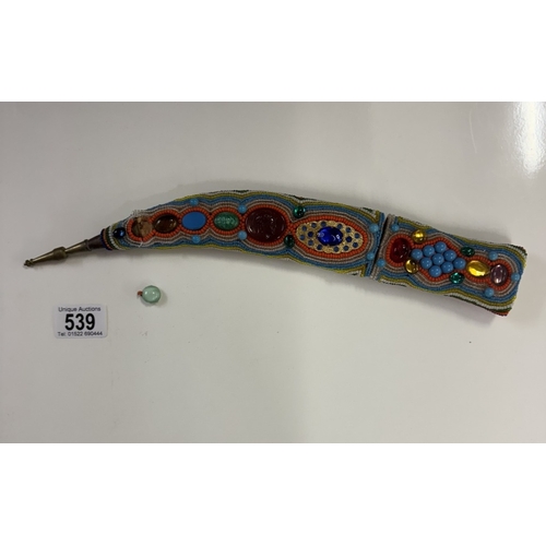 539 - AN Eastern dagger with beaded grip & scabbard