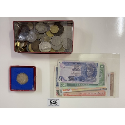 545 - A quantity of mixed coins and bank notes