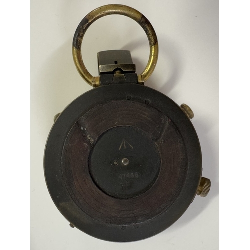 546 - An early military cased compass & An army handkerchief