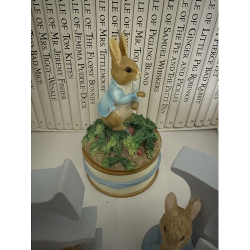 548 - A cased set of Beatrix Potter 'The World Of Peter Rabbit, A trinket box & 4 letters (BENE)