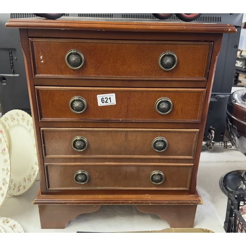 621 - A small mahogany four drawer chest