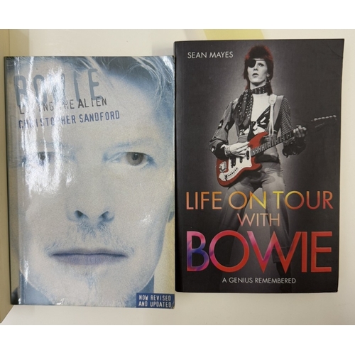 634 - A quantity of music books & DVDs including David Bowie related