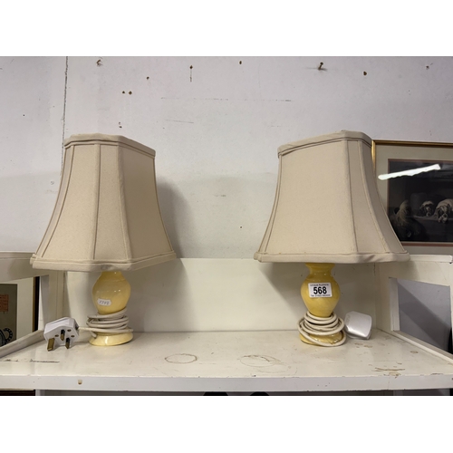 568 - A pair of vintage polished stone table lamps