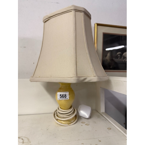 568 - A pair of vintage polished stone table lamps